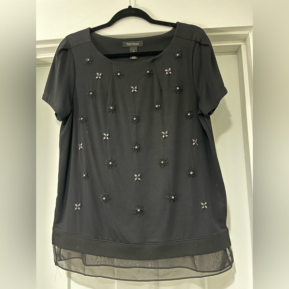 New without tags. White House Black Market beaded embellished top. Size medium.